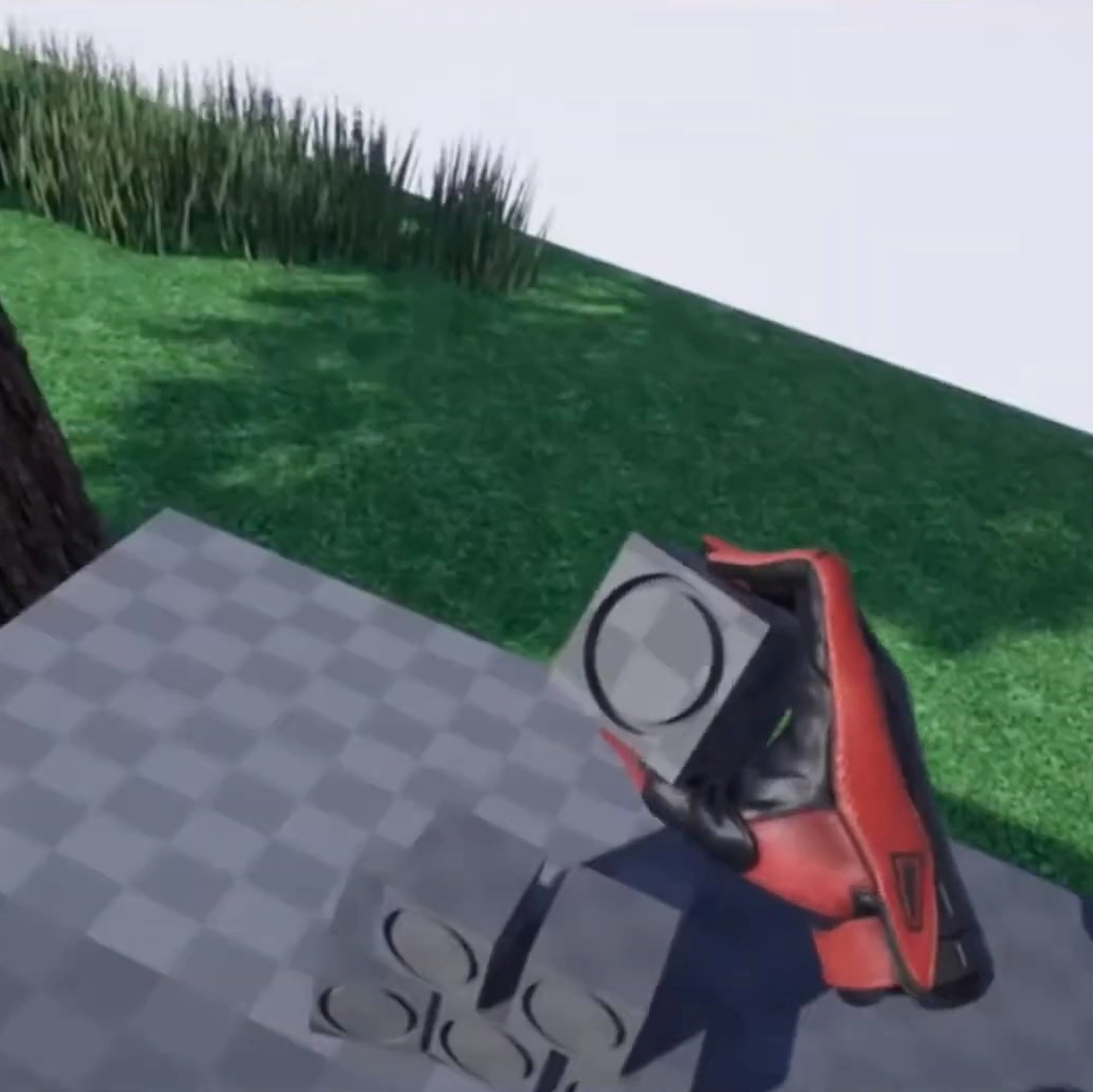 A virtual hand grabbing a cube